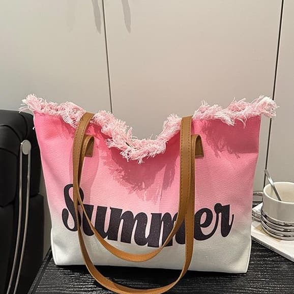 Designer Check Tote with Pouch" or "Monogram Shopper Bag Set"